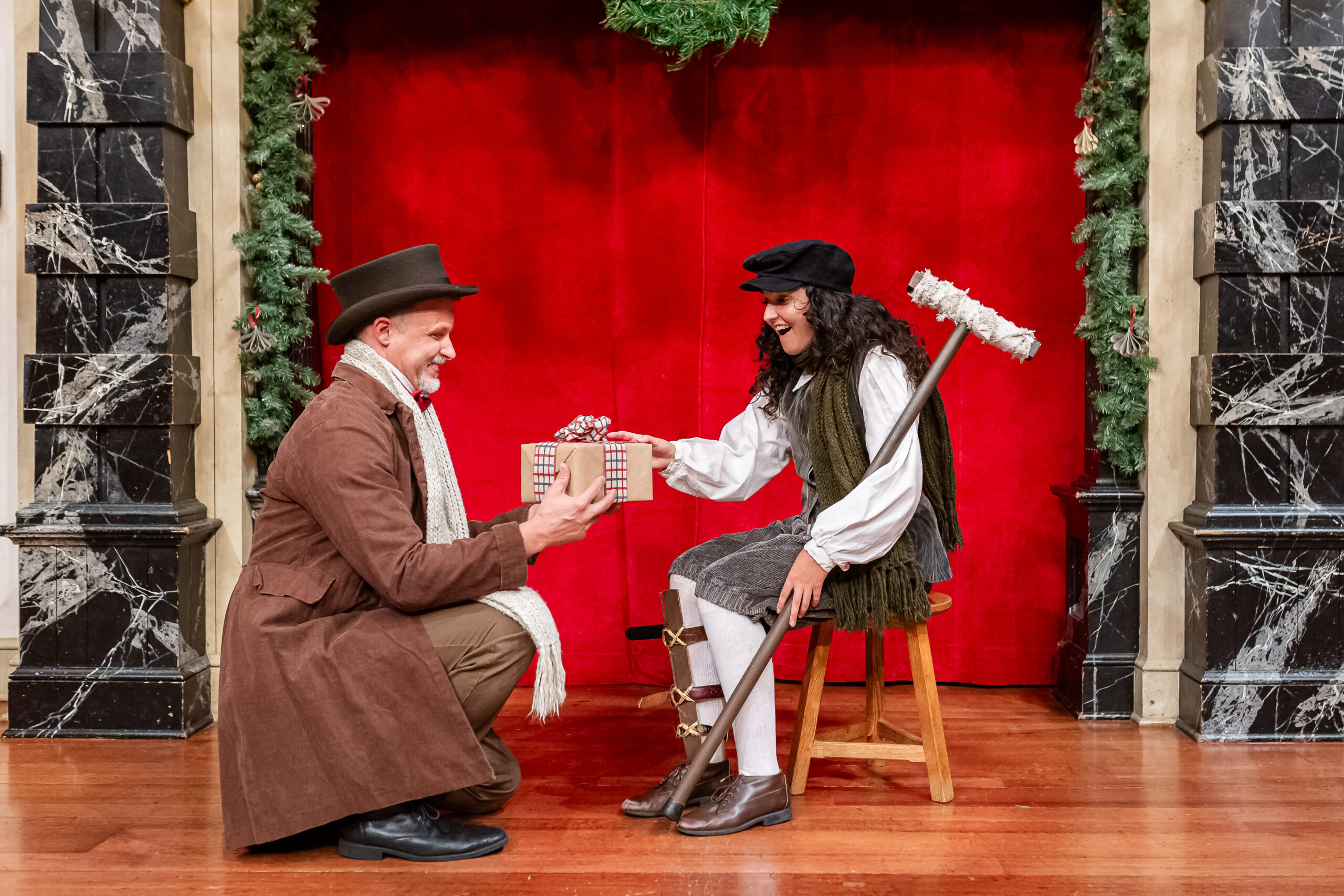 Ben Lambert and Molly Martinez-Collins star in A Christmas Carol at American Shakespeare Center Blackfriars Playhouse in Staunton, VA. Photo by October Grace Media.