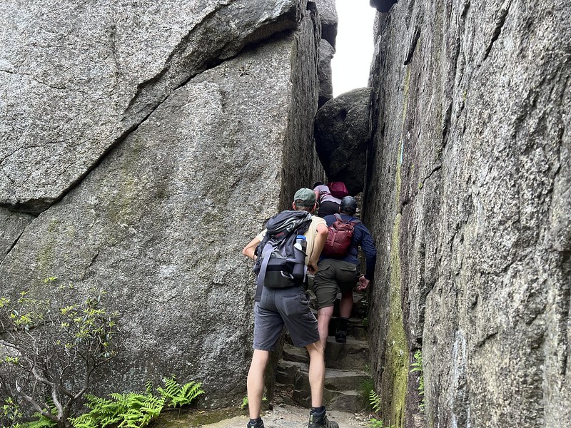 People Rock Scramble Old RagNPS Hikers in the basalt columnar jointing shoot (stairs on Old Rag)