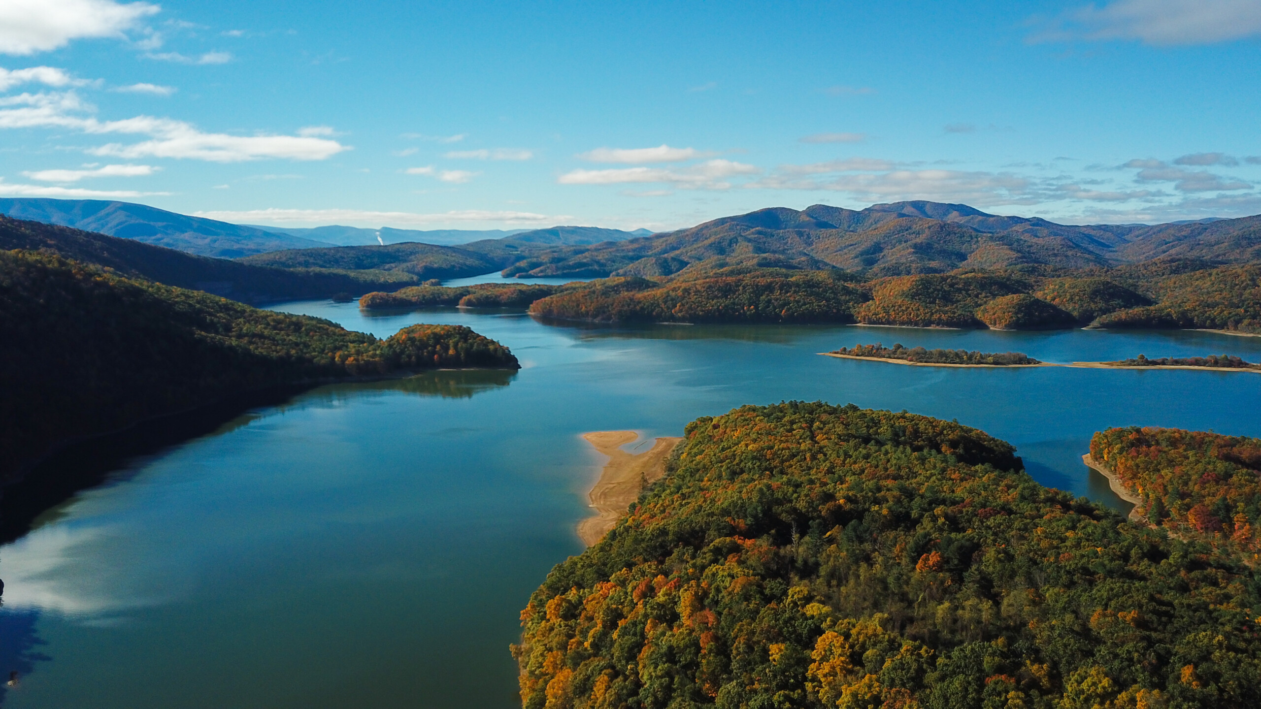 Located in Bath County and divided by Lake Moomaw, the two tracts of the Gathright Wildlife Management Area contains 13,428 acres, encompassing three major mountains, Allegheny and Bolar Mountains west of the lake, and Coles Mountain to the east. Elevations range from 1,400 to 3,600 feet. The area’s long northwest boundary is marked by the crest of Allegheny Mountain where Virginia and West Virginia adjoin. Numerous streams flow eastward from the steep side of Allegheny Mountain and have created a series of secondary ridges and hollows that terminate at Mill Creek. The primary habitat found on the area is upland hardwood forest. Stands of oak/hickory and mixed oaks are the major forest types. Tulip popular grows in the more fertile hollows and small herbaceous openings are interspersed throughout much of the management area. Lake Moomaw, occupying land that was once part of the management area, adds to the recreational opportunity offered by Gathright. Virginia Tourism Corporation, www.Virginia.org